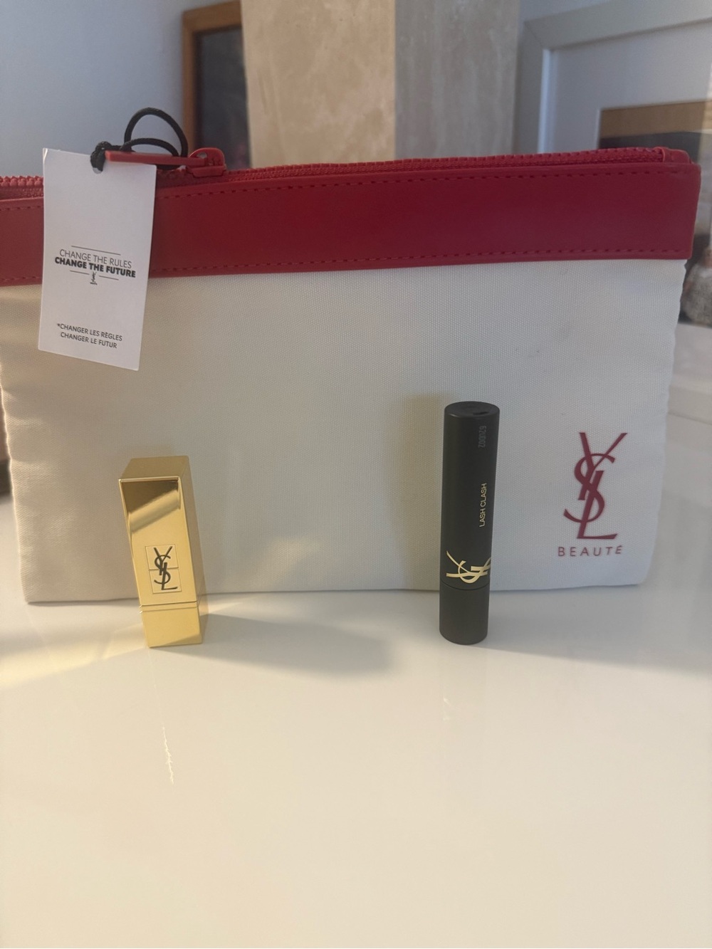 Yves Saint Laurent White & Red Cosmetic Pouch with red lipstick & black mascara